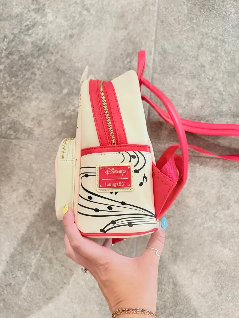 Disney 100 Years of Wonder Music & Wonder Loungefly-style mini backpack